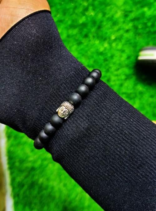 Black marble stone bracelet with a Buddha charm is an exquisite and meaningful piece of jewelry