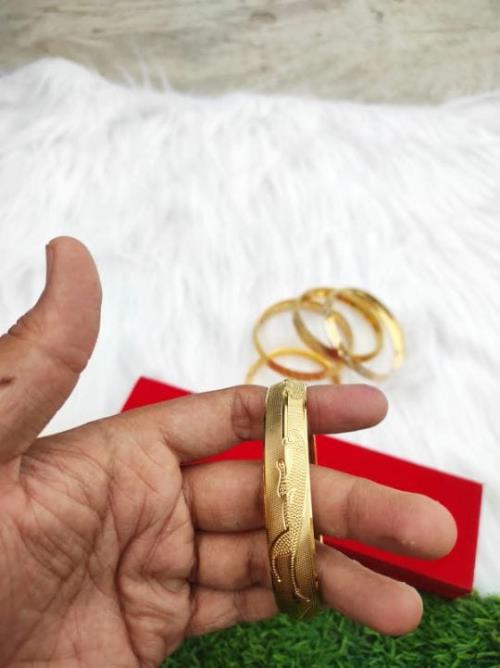 Gold forming jeguar kada