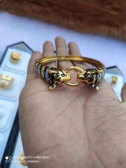 Mens Gold plated tiger kada .