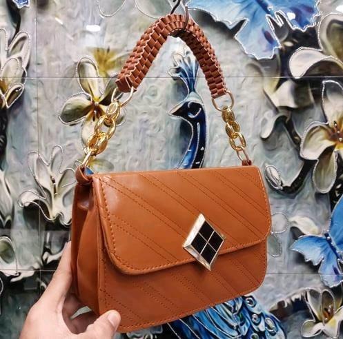  SLING BAG WITH STRAP .