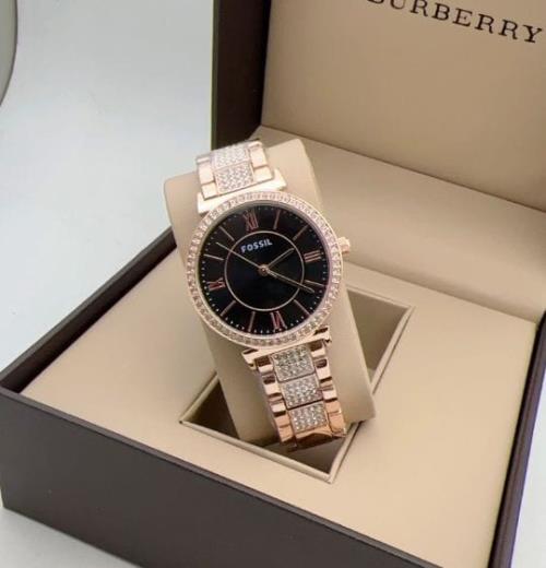 Fossil Women's Watch: Timeless Elegance with Date Functionality.
