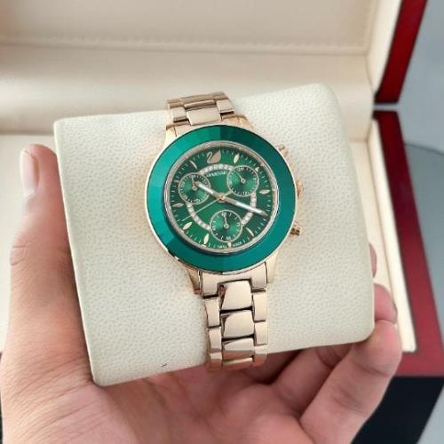 Swarovski Round shaped Rosegold case Ladies Watch .