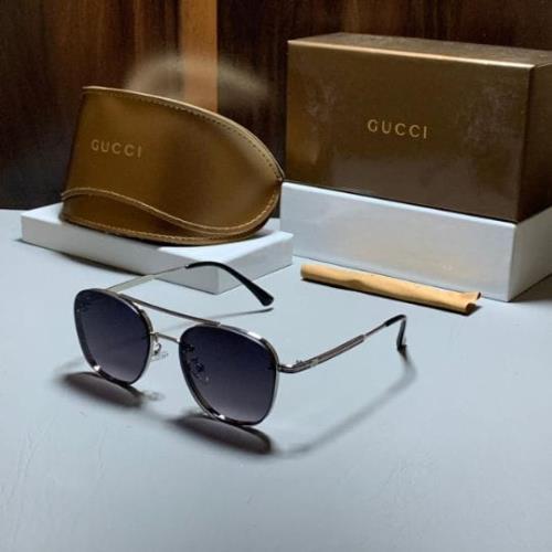 Gucci Sunglasses.