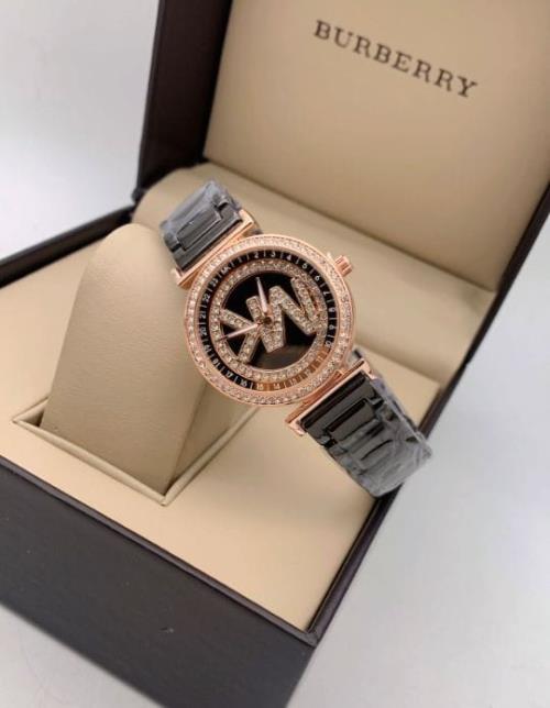 MICHAEL KORS  LADIES WATCH .