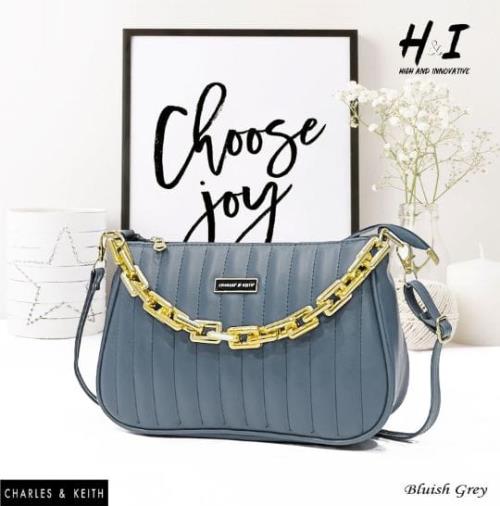 CHARLES & KEITH HIGH QUALITY SLING/SHOULDER BAG.