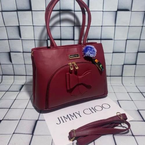 Hand bags with adjustable long belt .