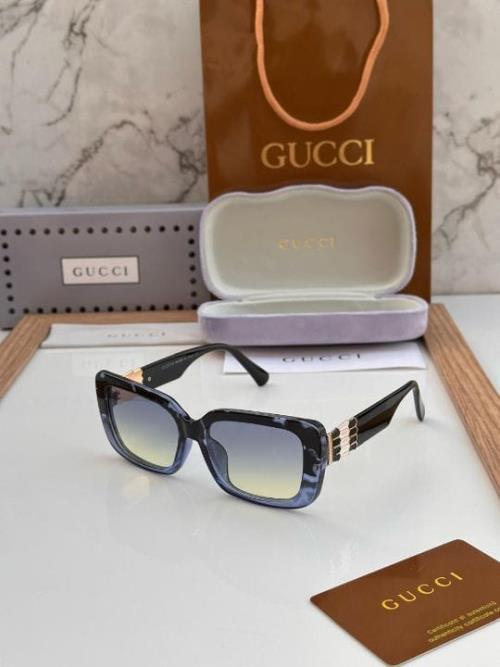 Inspired Gucci Women's Oversized Square Gradient Sunglasses – Blue Marble Frame with Gold Accent Arm