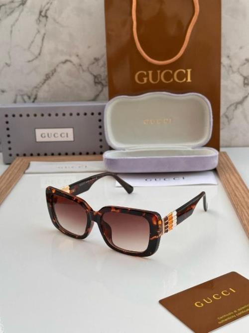 inspired by Gucci Women's Oversized Square Gradient Sunglasses – Blue Marble Frame with Gold Accent 