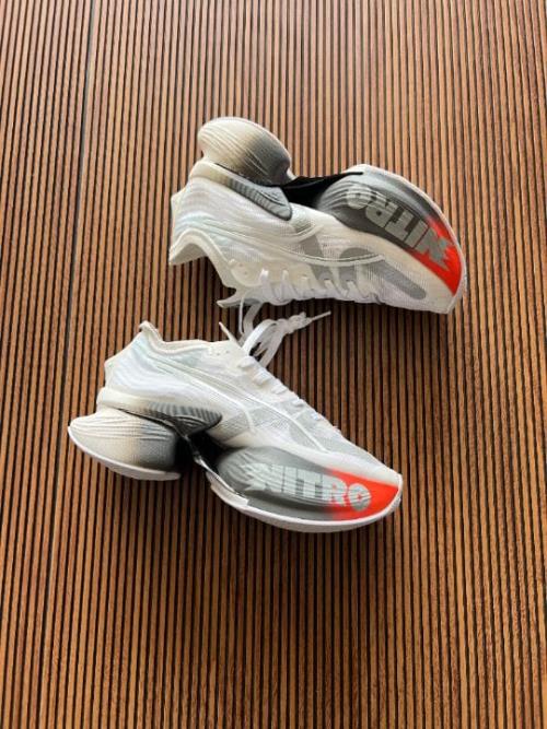 inspired by Puma Fastroid Nitro - Innovative Running Shoes for High Performance.