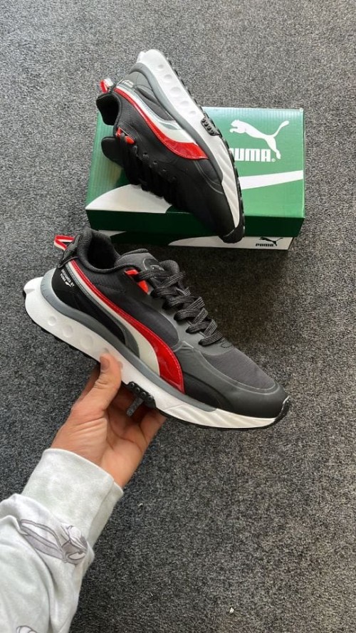 PUMA WILD RIDER PATENT SHOES.