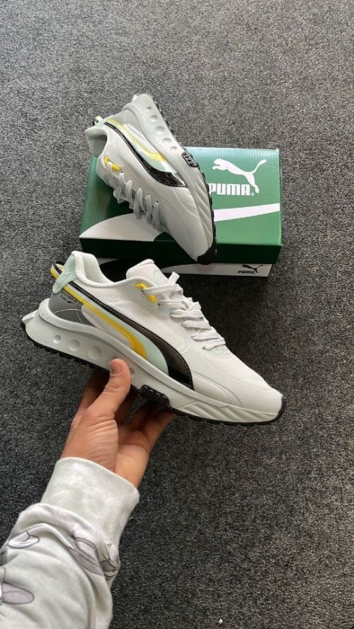 PUMA WILD RIDER PATENT SHOES.