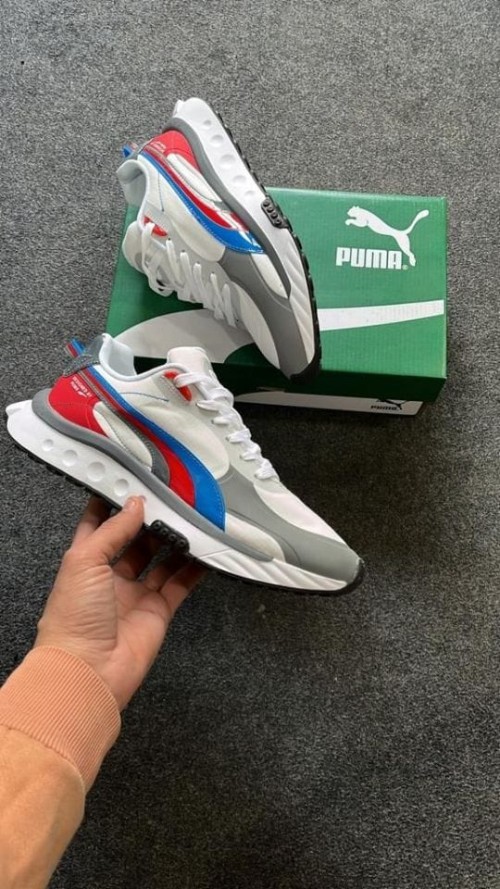 PUMA WILD RIDER PATENT SHOES.
