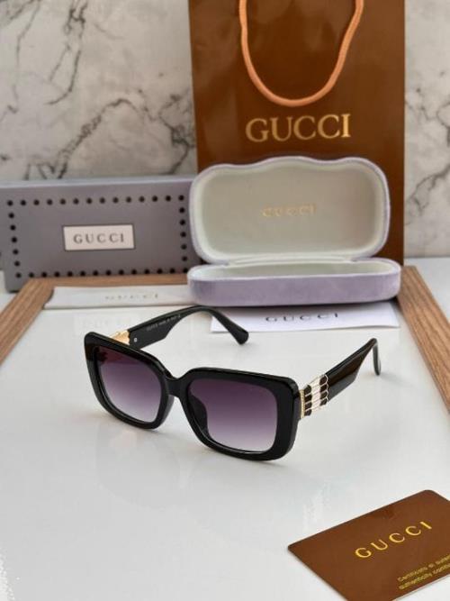inspired by Gucci Women's Oversized Square Gradient Sunglasses – Blue Marble Frame with Gold Accent 